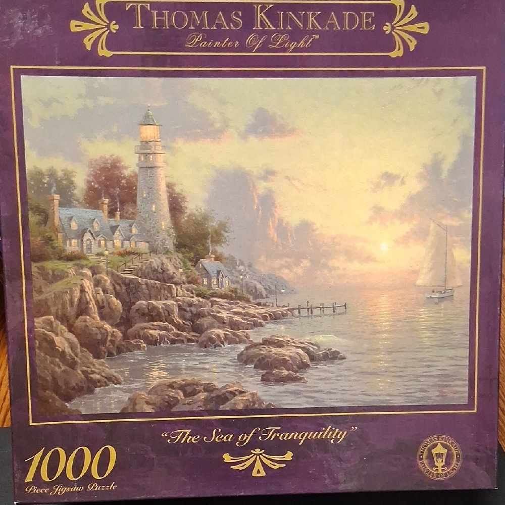 Thomas Kinkade Coastal Lighthouse Puzzle with Purple and Blue Tones
